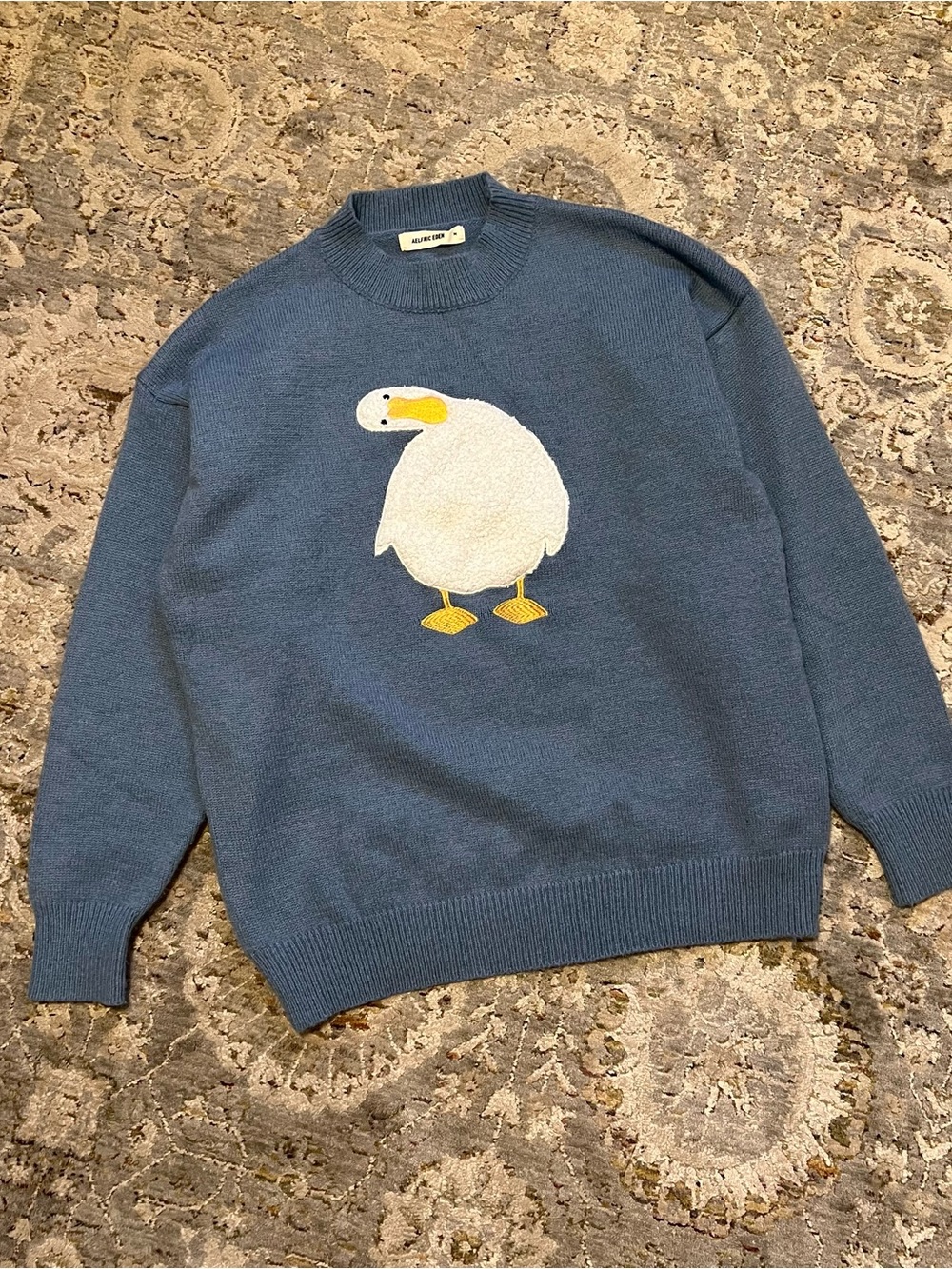 Aelfric Eden Blue Crewneck Sweater with White Duck Patch and Yellow Accents